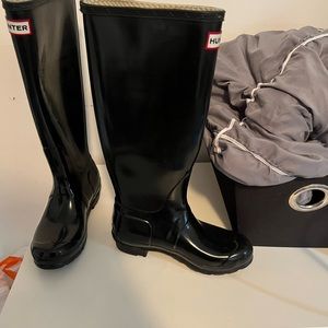 Glossy black hunter boots
